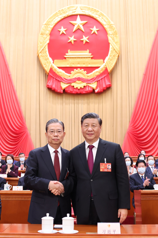 习近平同新当选的全国人大常委会委员长赵乐际握手.jpeg 习近平同新当选的全国人大常委会委员长赵乐际握手.jpeg