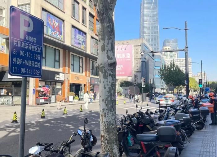 破解商圈治理难题 徐汇试点分时共享停车 早高峰停单车 午高峰给骑手
